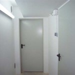 Aplicación de esmalte sintético en puertas del garaje
